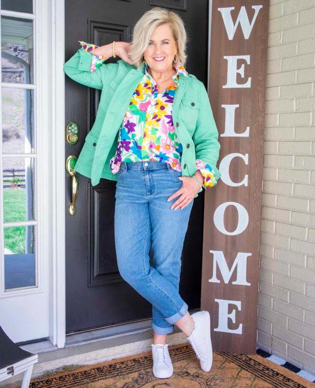Woman wearing various statement streetwear pieces