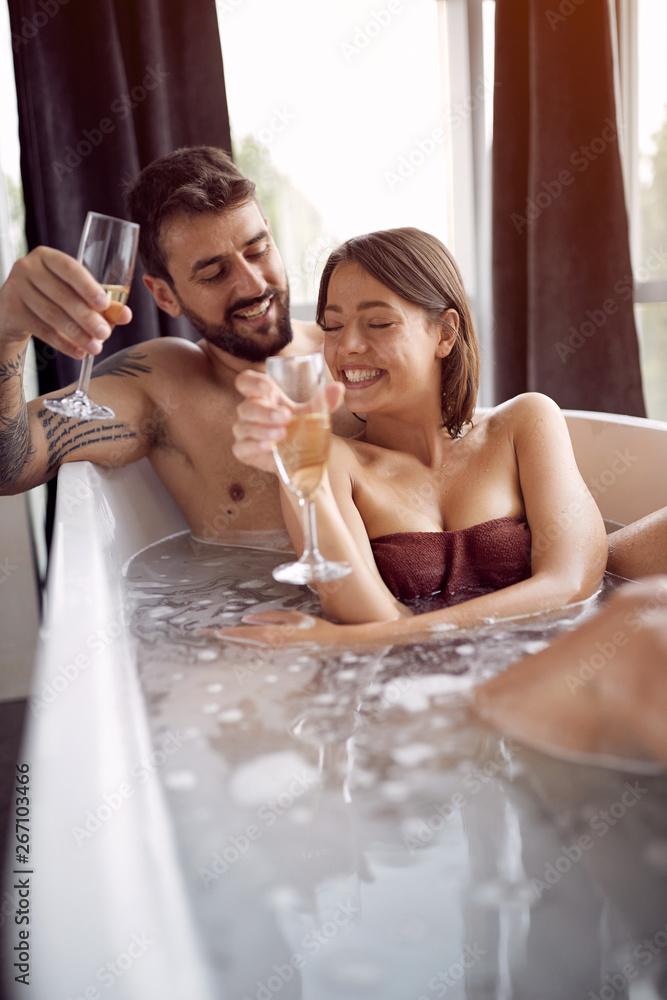 couple relaxing in a bubble bath