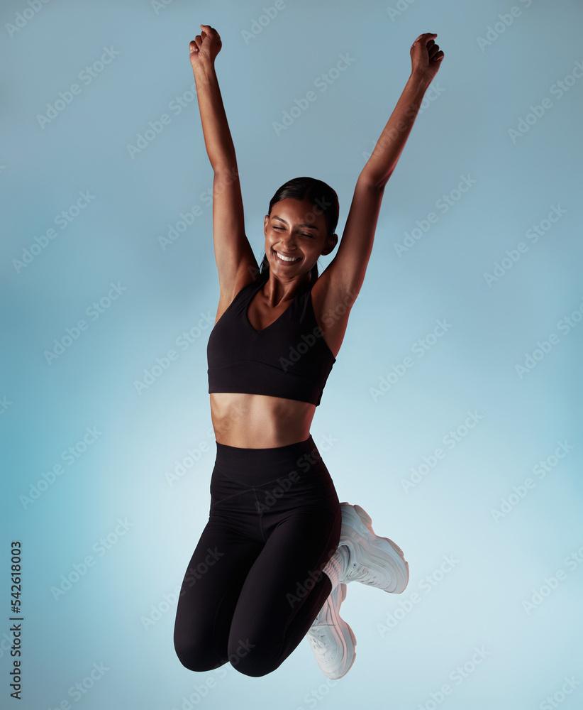 woman celebrating fitness success