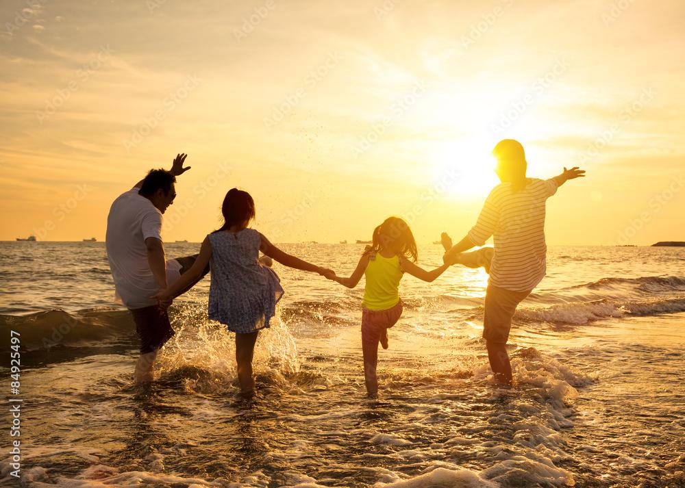 family enjoying a beach vacation