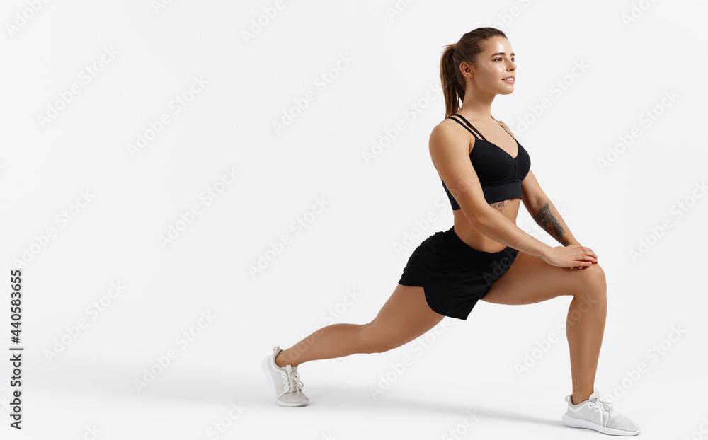 Woman stretching before a workout
