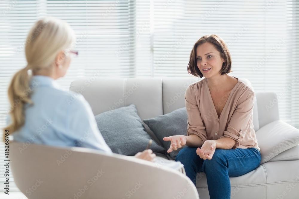 woman talking with therapist