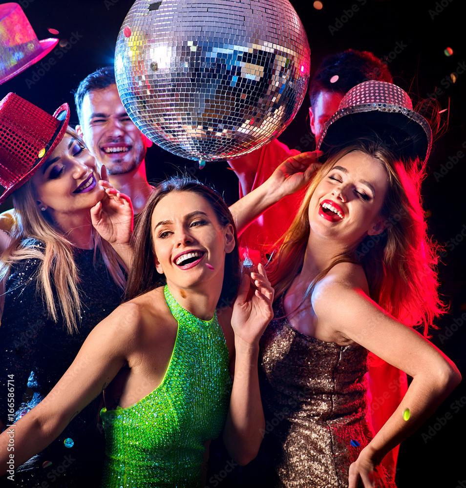 people dancing at a night party