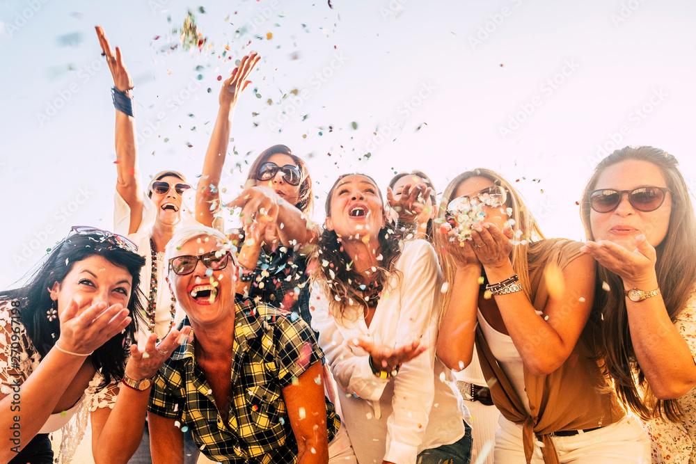 group of friends having fun and laughing responsibly at a party