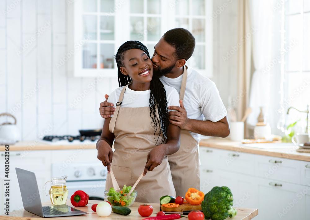 couple cooking a meal together