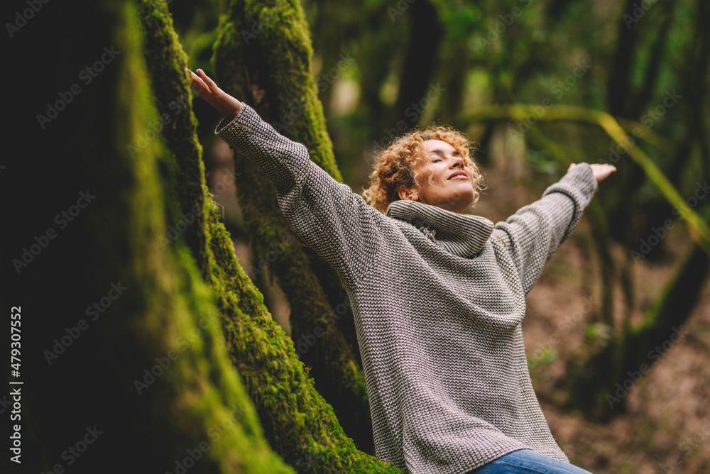 woman looking happy and content in nature