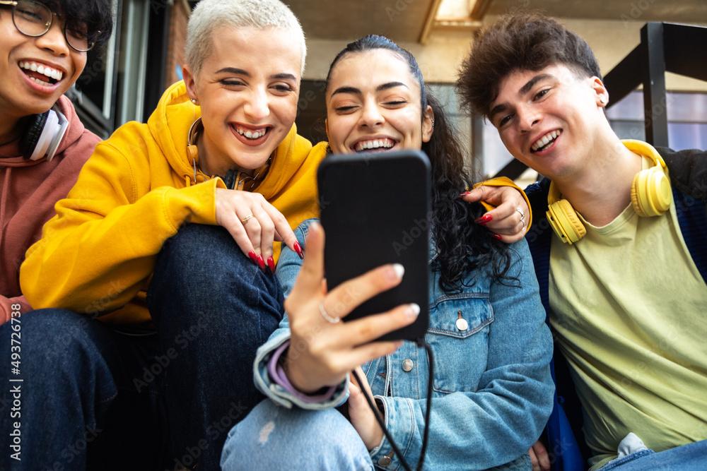 happy college student using phone