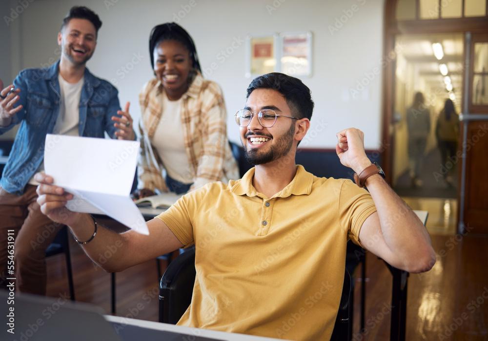 happy college student celebrating exam success