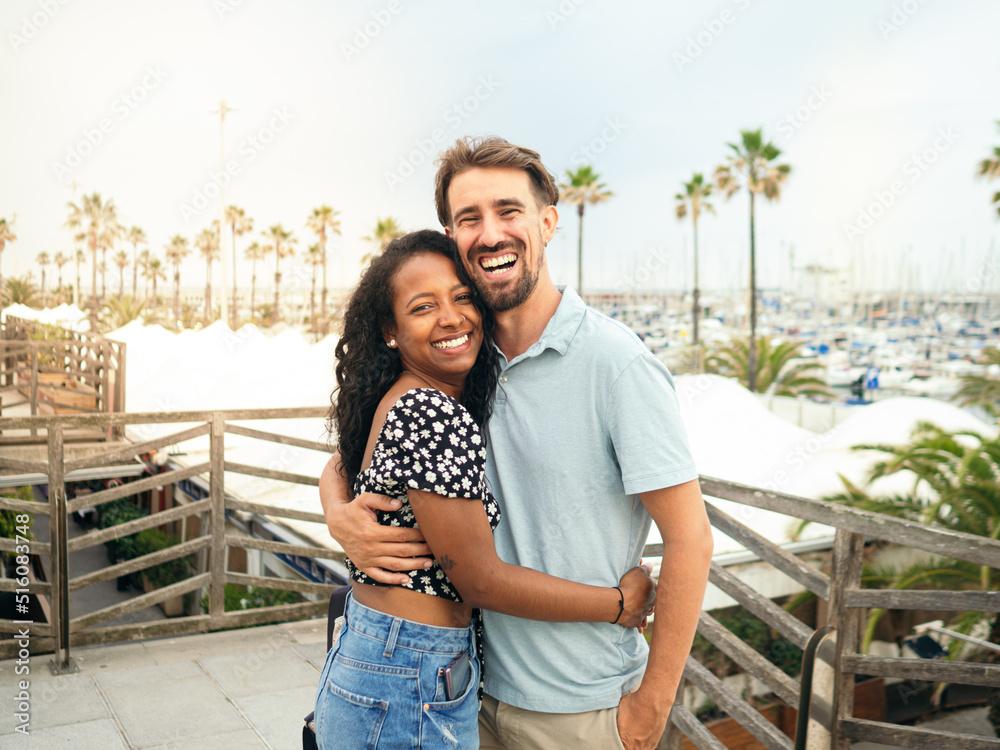 Couple looking at photos from their trip