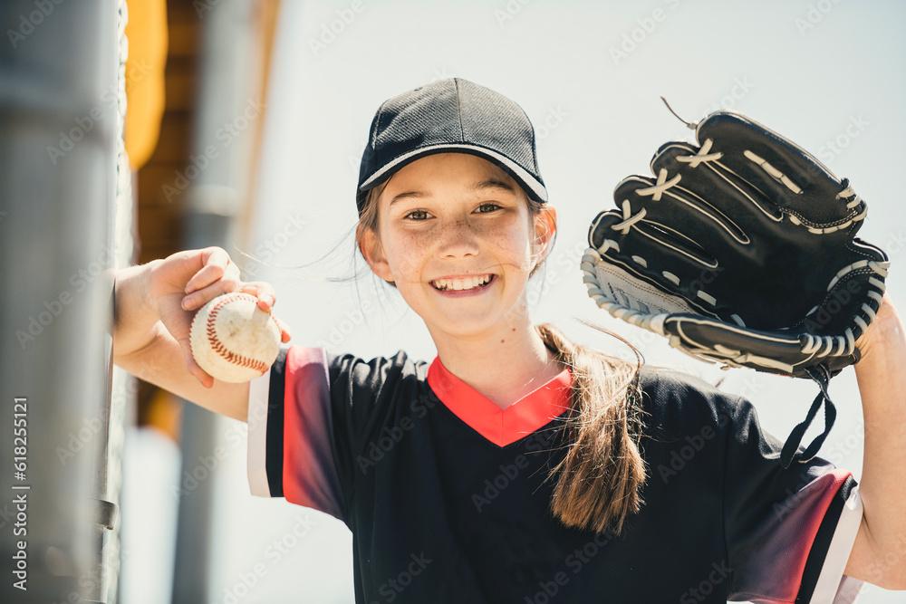 woman playing softball on a sunny day