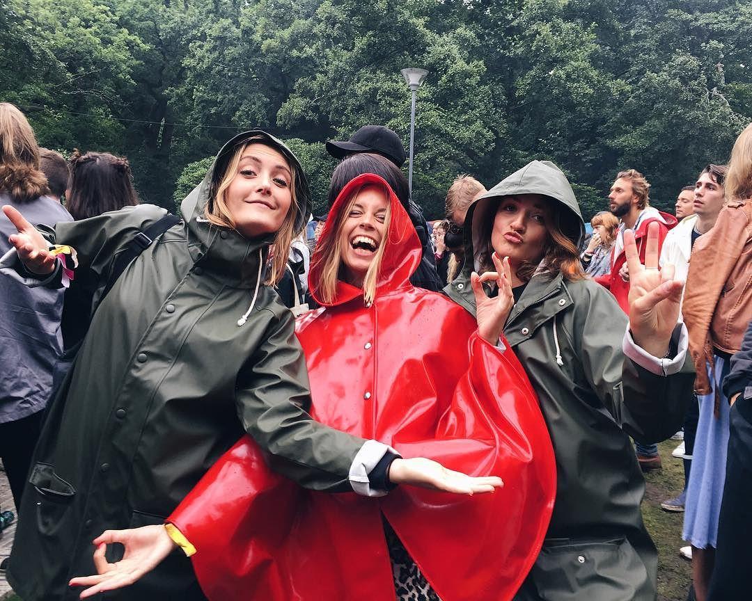 woman wearing a raincoat at a festival