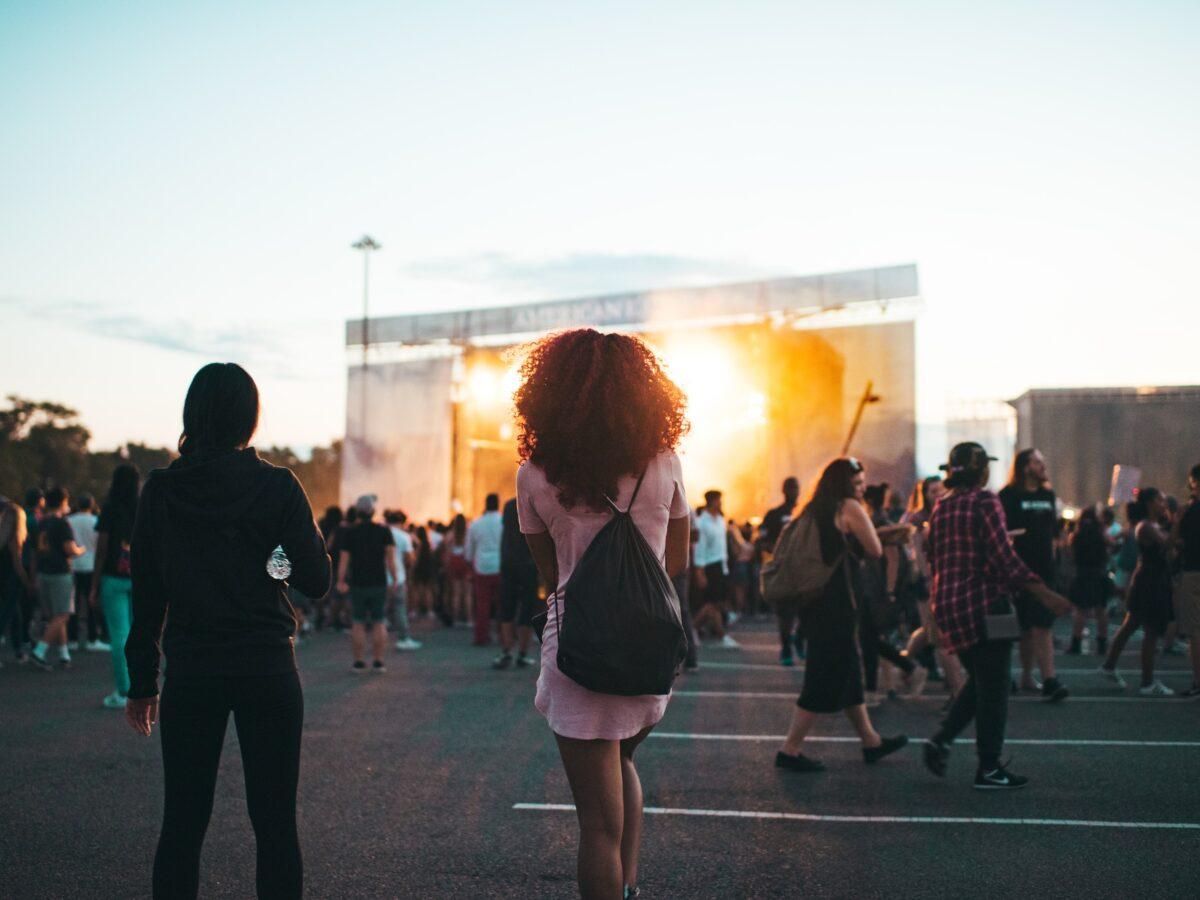 girl with blisters on her feet at a music festival