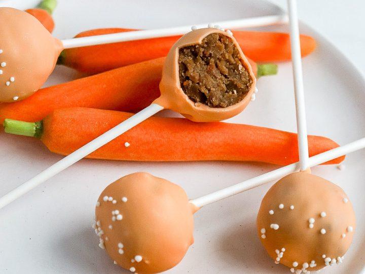 Close-up shot of someone assembling carrot cake popsicles