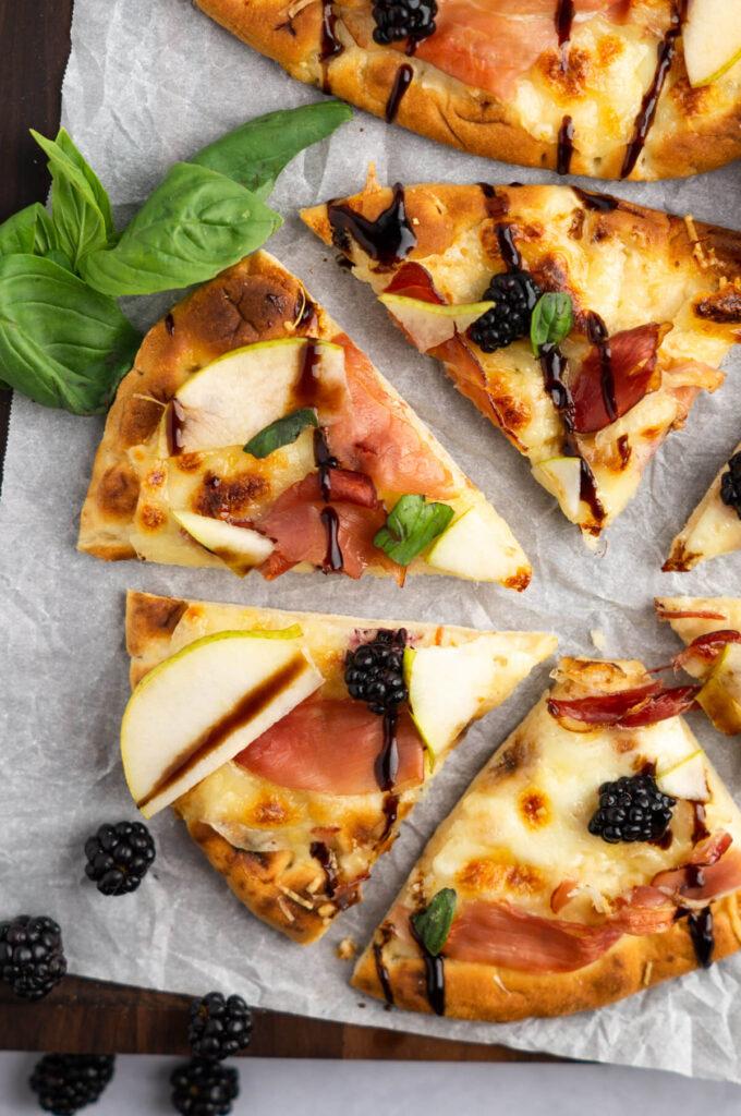 Blackberry Strawberry Shortcake Pizza on a wooden board, close-up