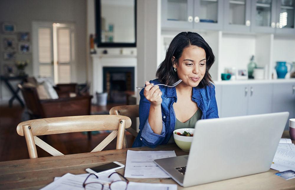 woman researching intermittent fasting on her laptop