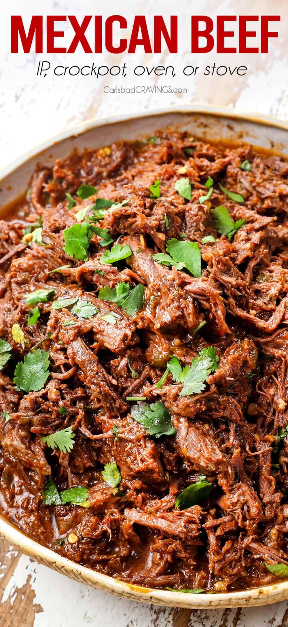 A close-up of shredded chili-pepper beef roast, demonstrating its tender texture