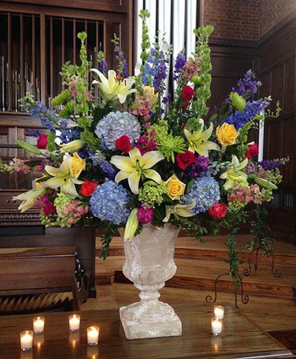 different colored prom bouquets arranged on a table