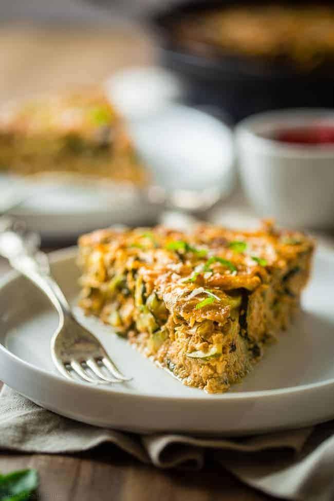 finished spinach and artichoke zucchini bake plated and ready to serve
