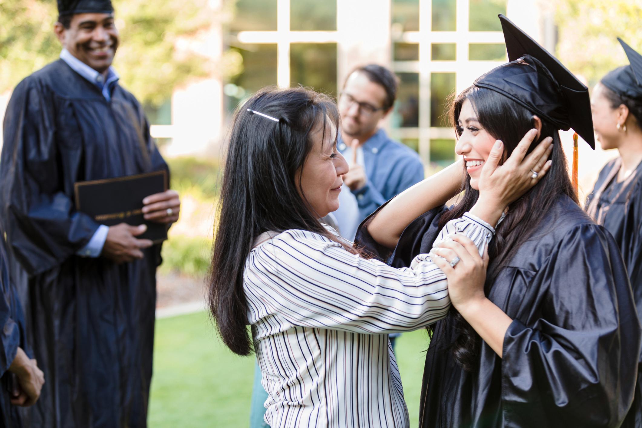 proud parents watching graduation