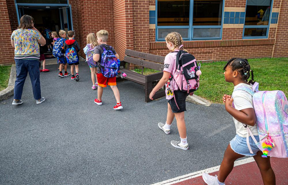 students arriving at school on the first day