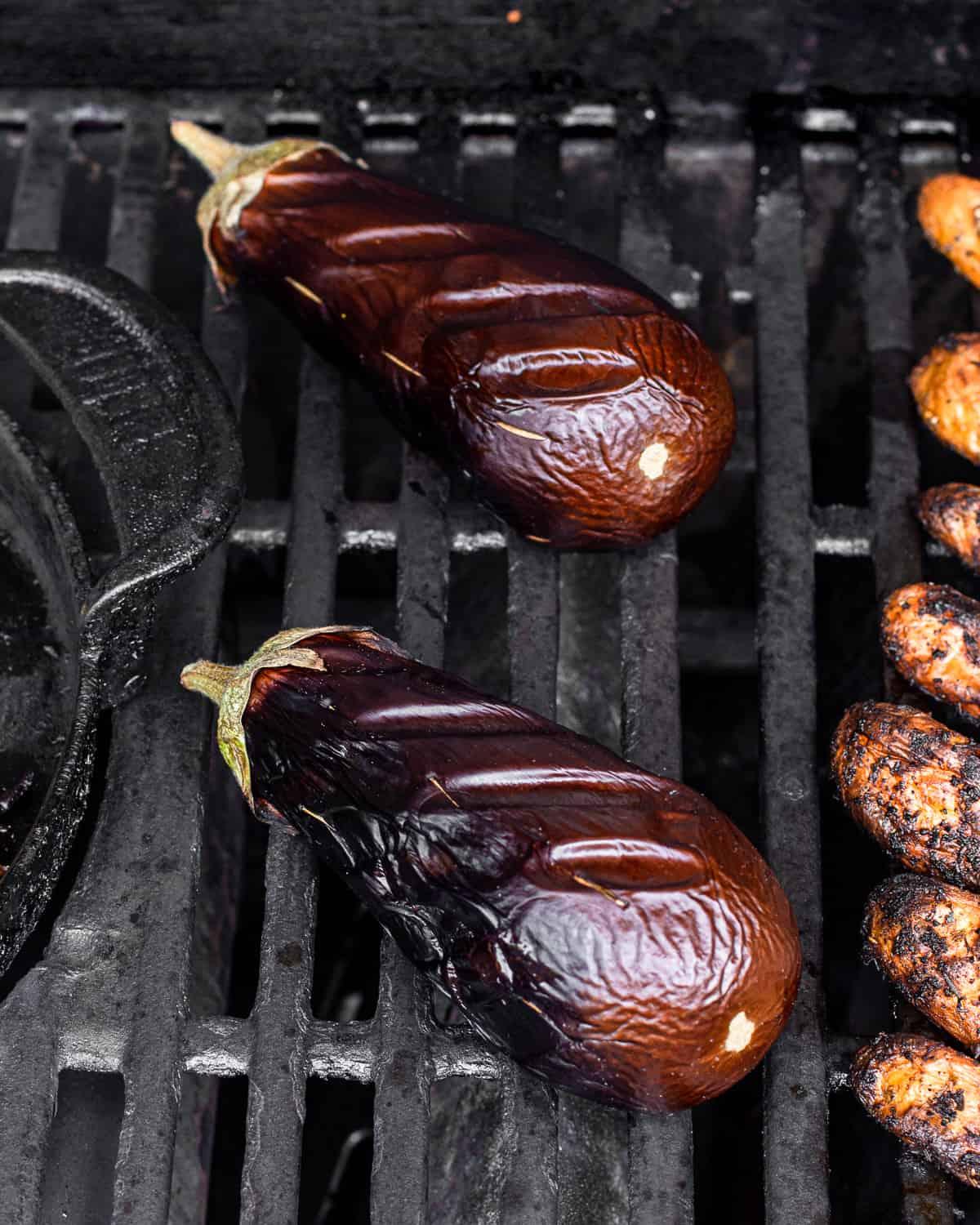 eggplant being grilled on an outdoor grill