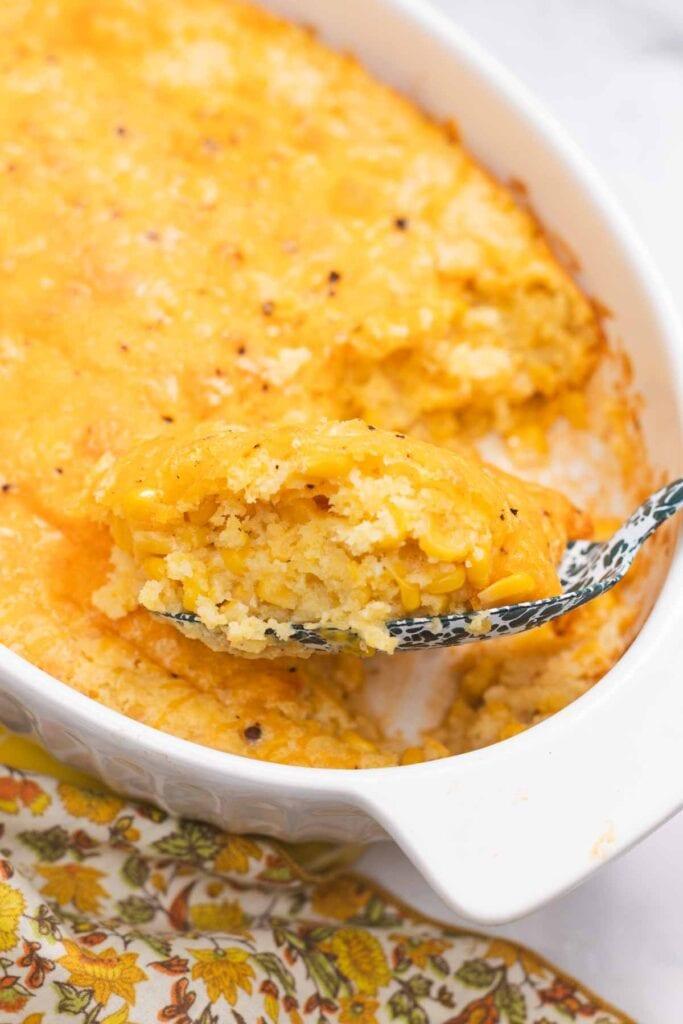 Cozy kitchen scene with a family dinner spread, highlighting a corn casserole dish