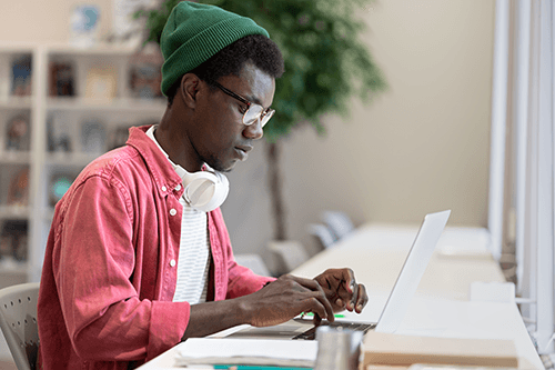 college student using LinkedIn on a laptop