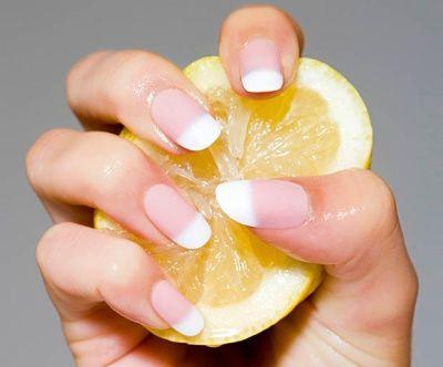 woman using home remedies for yellow nails