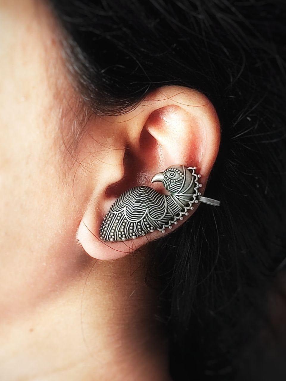 closeup of intricate ear cuff designs