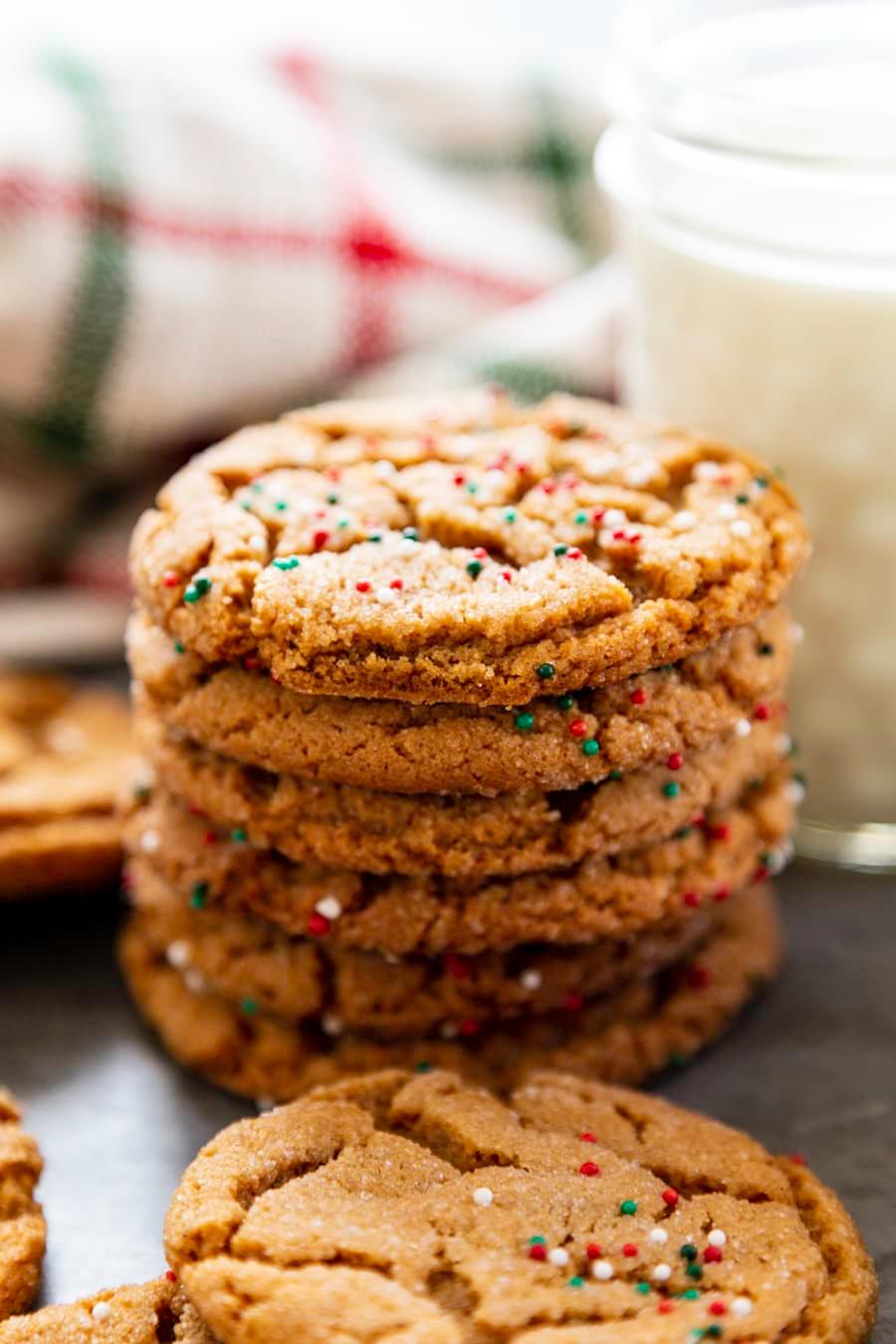 Grandma baking ginger cookies in a warm, rustic kitchen, soft lighting