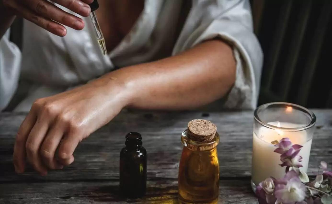 Aromatherapy session with essential oils and candles
