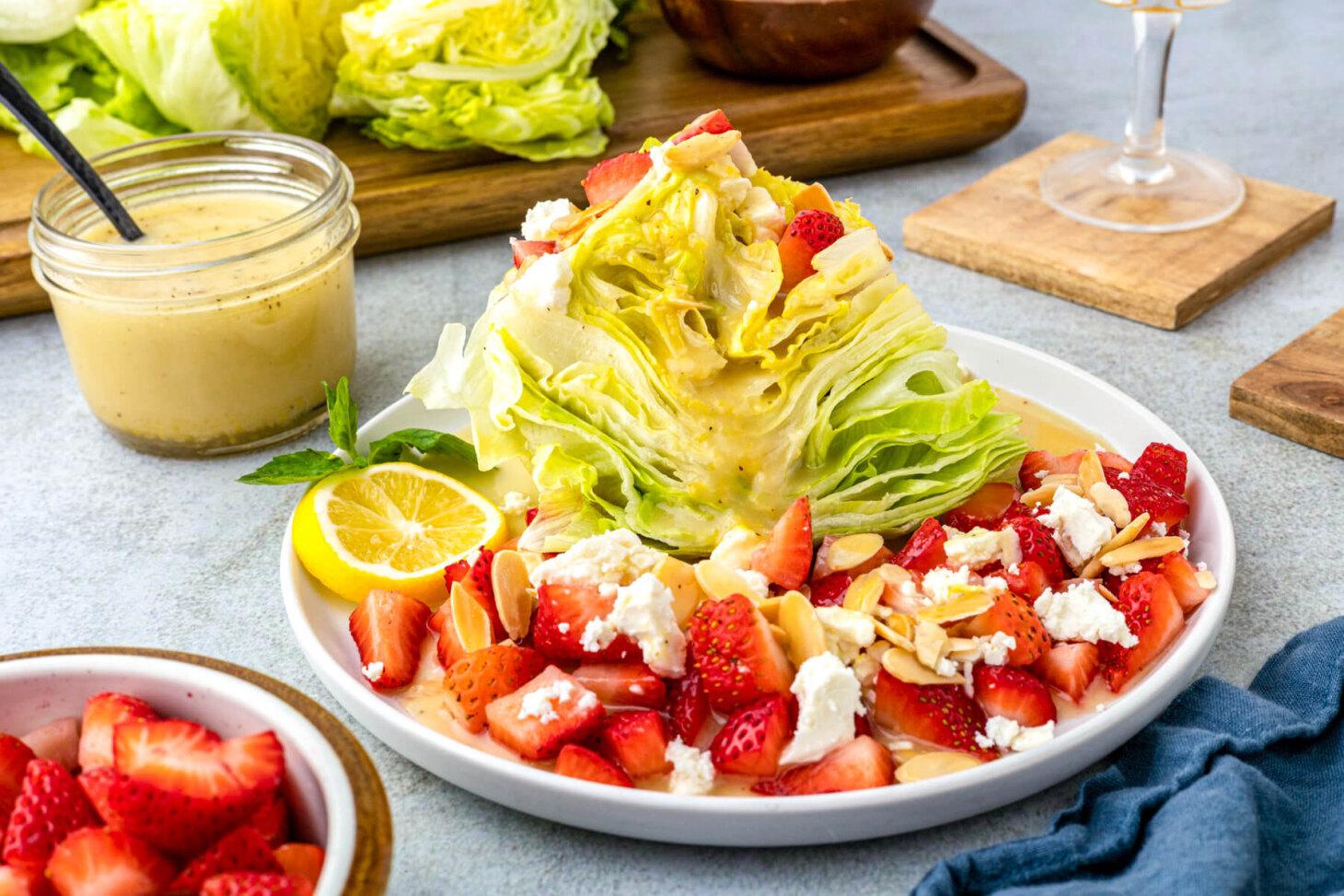 close-up shot of the strawberry feta lime salad with lime wedges