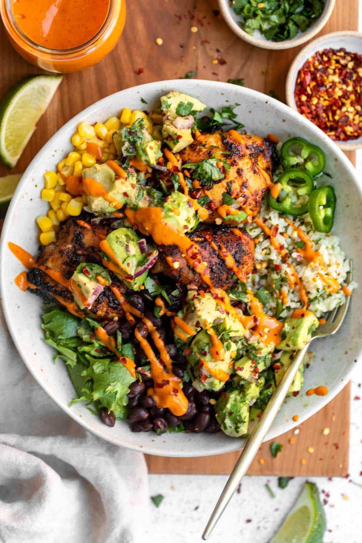 fresh cilantro lime chicken bowl with avocado and rice