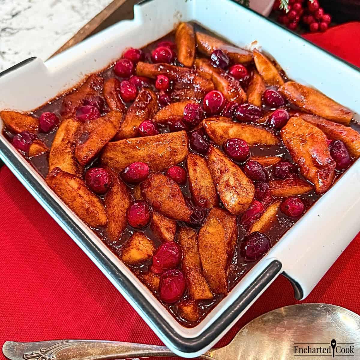 fresh cranberries and sliced apples ready to be cooked