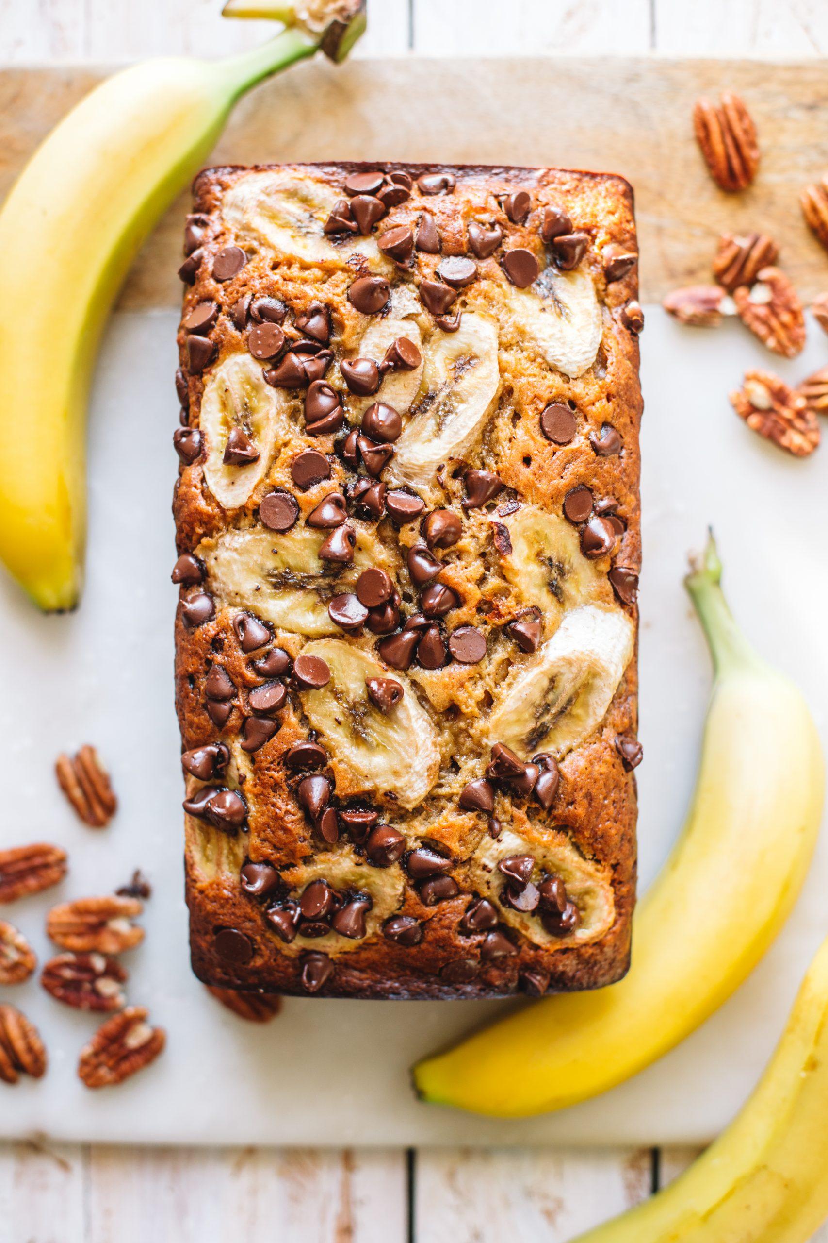 collage of different banana bread variations with various mix-ins like chocolate chips and nuts