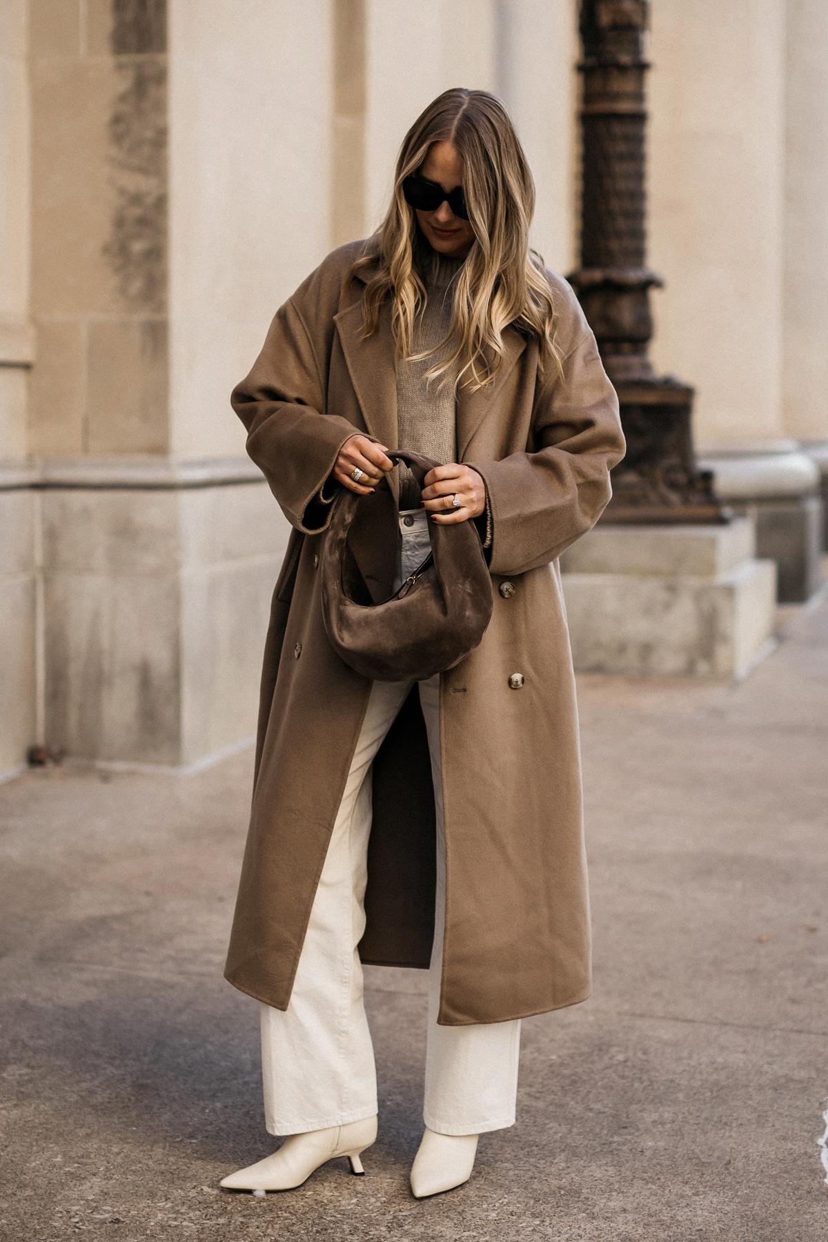 woman wearing a neutral-toned winter outfit
