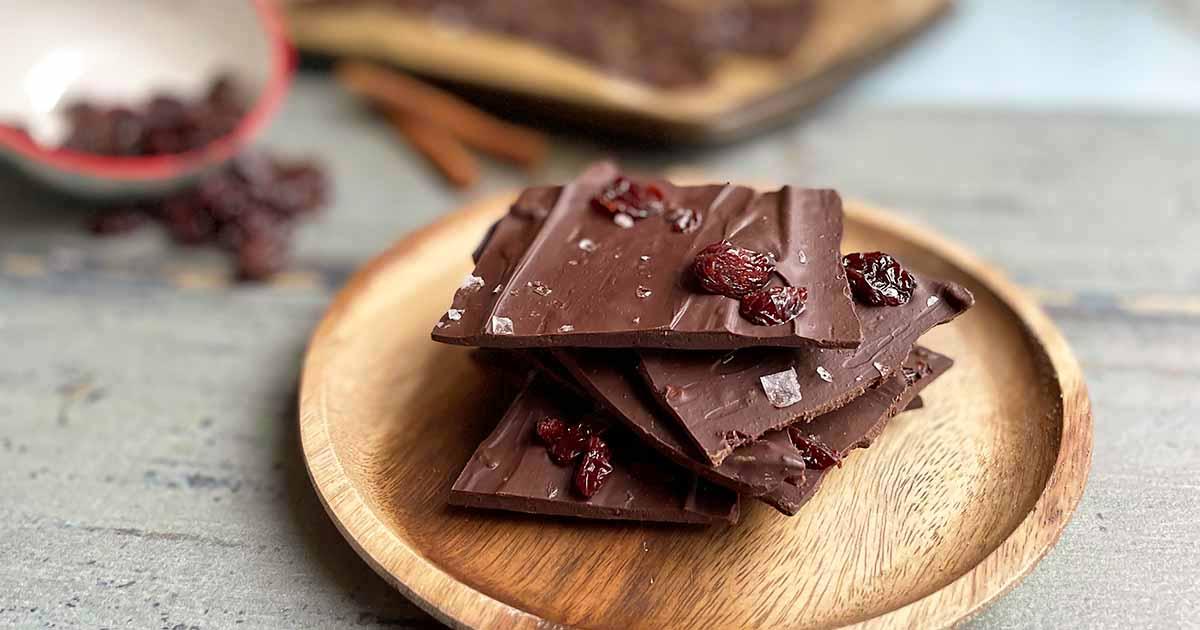 artisan chocolate bars with chili flakes in a traditional Mexican market setting