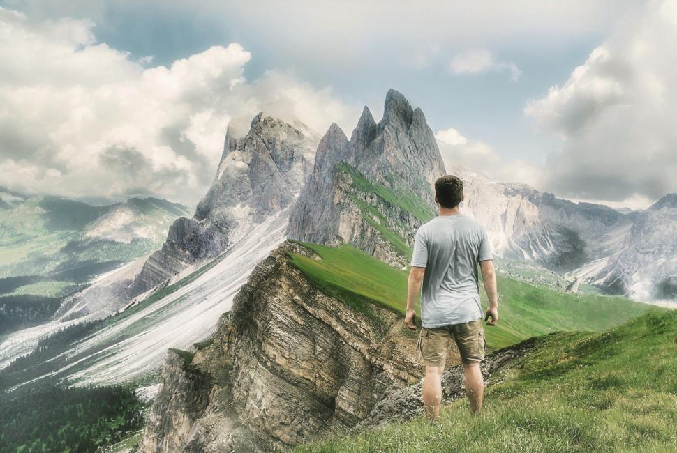 hiker looking at mountains