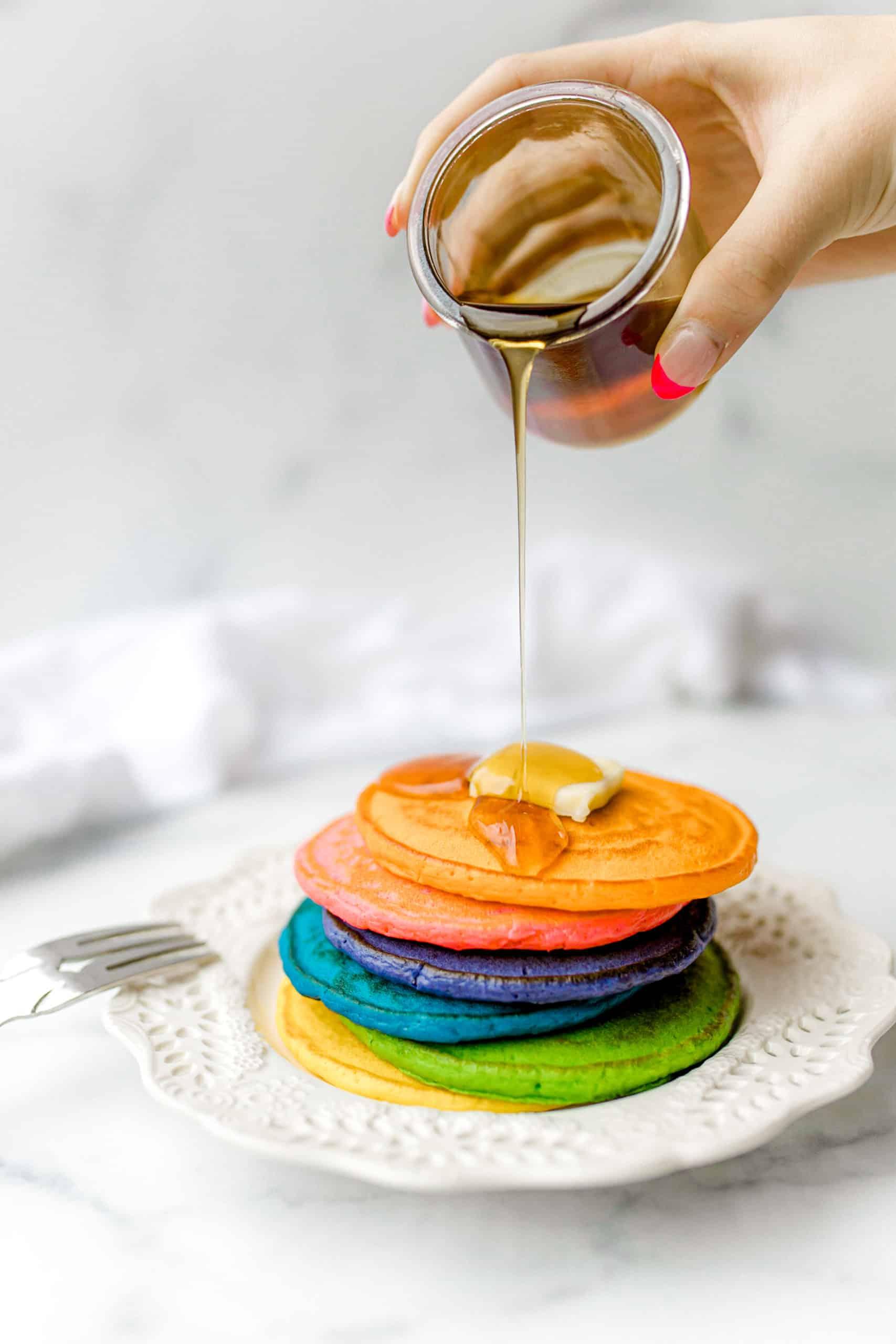 close-up shot of colorful patriotic pancakes being flipped on a griddle