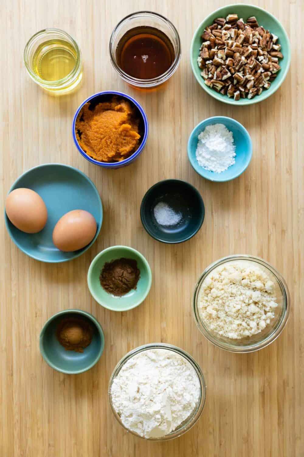 ingredients for pumpkin bread laid out on a kitchen counter