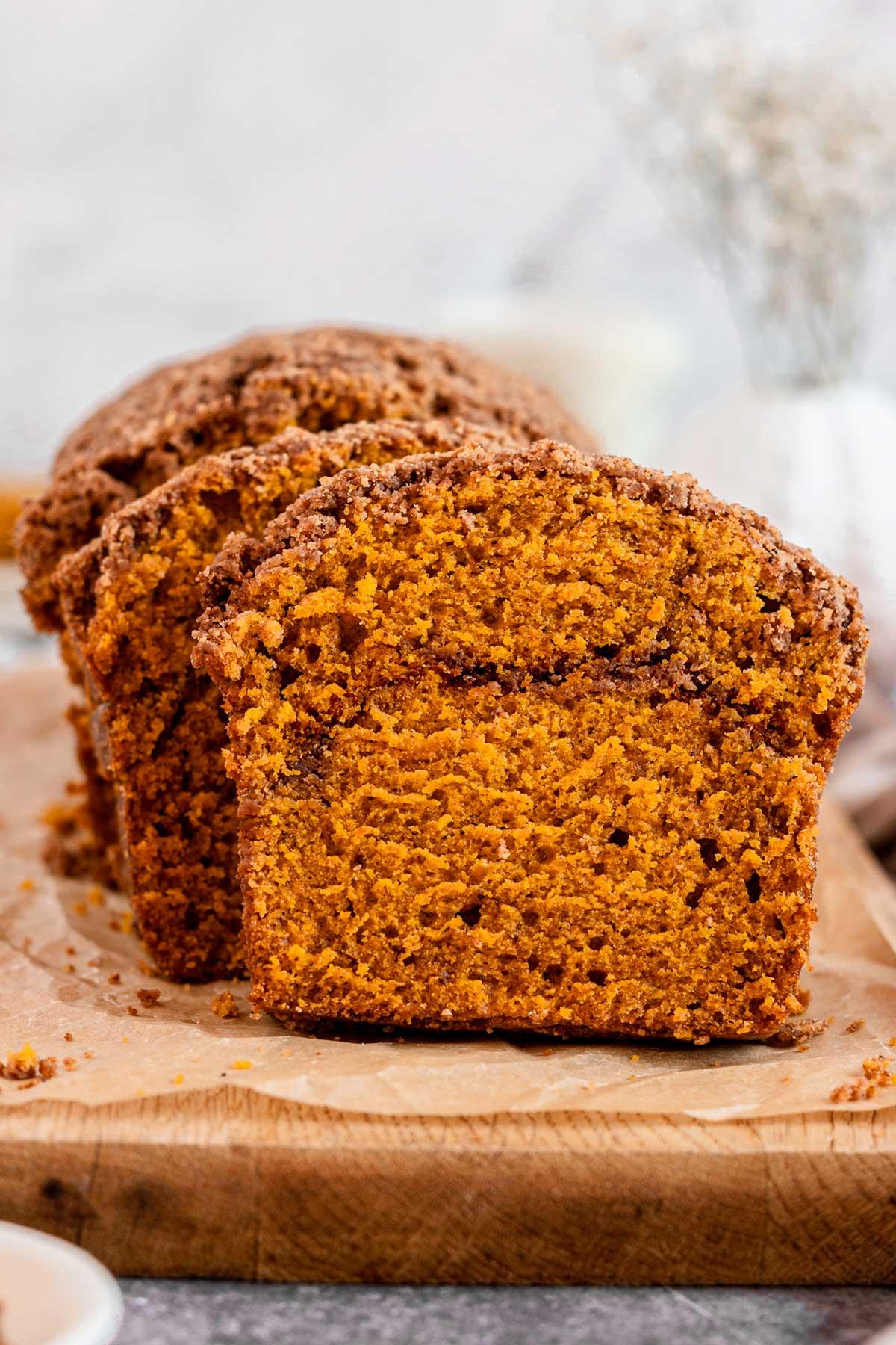 close up of pumpkin streusel bread slices