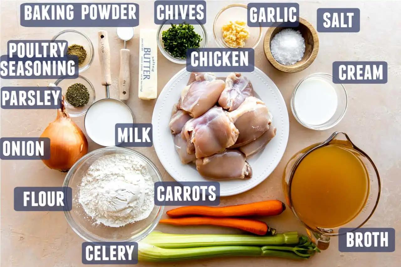 ingredients for slow cooker chicken and dumplings laid out on a kitchen counter