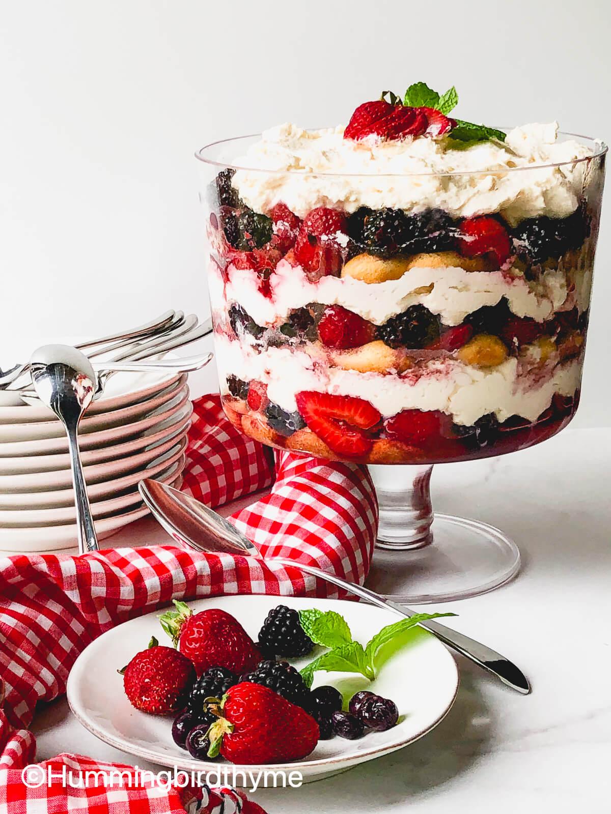 several summer berry trifle dessert shooters on a tray