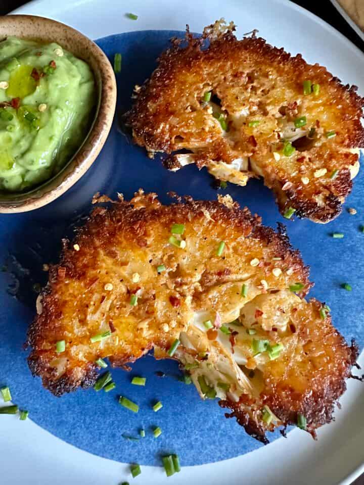 close up shot of garlic parmesan crust on baked cauliflower steak