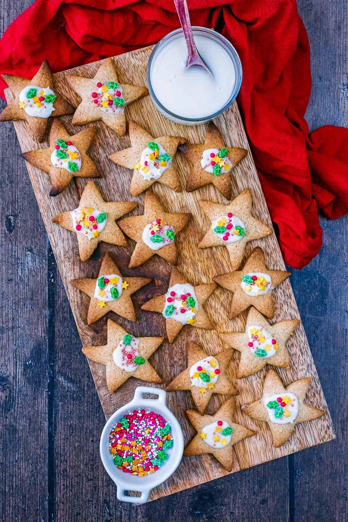Finished star cookies arranged beautifully on a serving platter with a colorful background