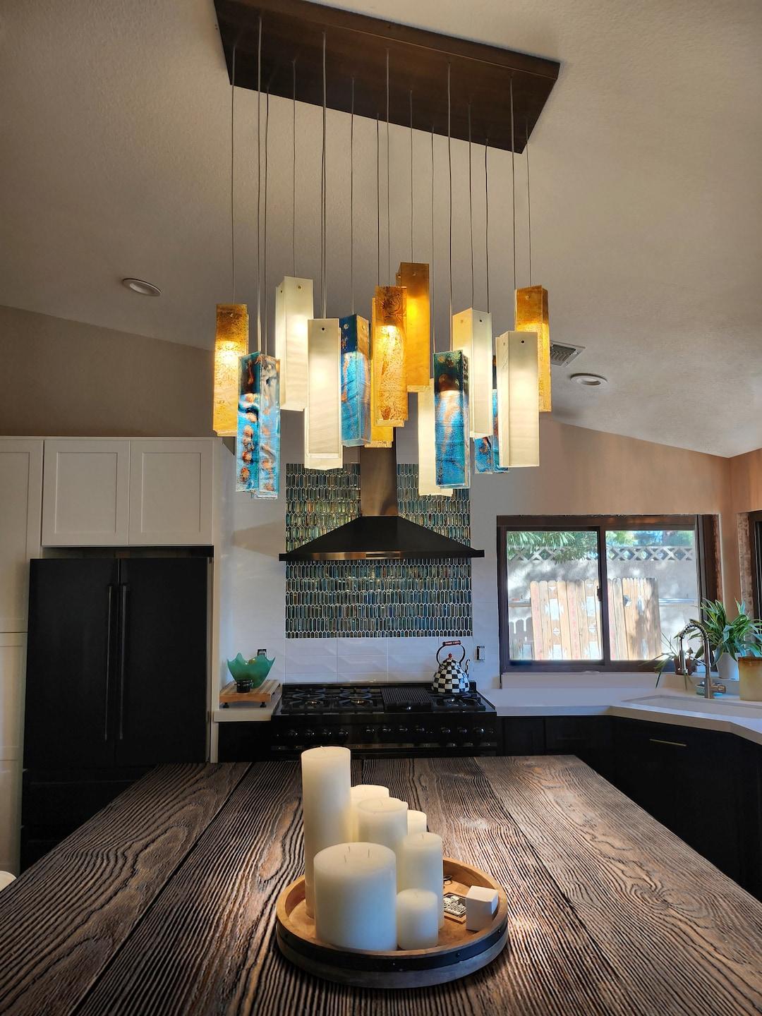 colored glass pendant lights in a dining room