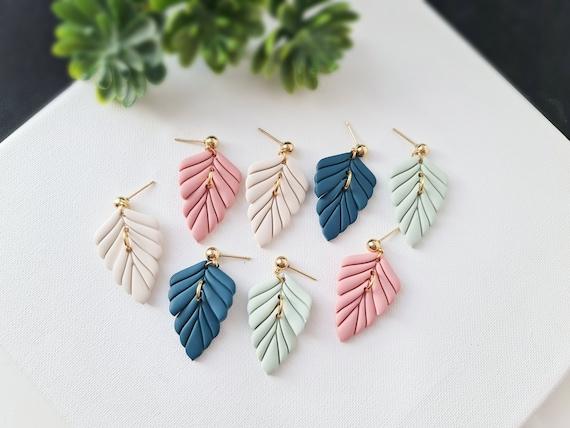 collection of colorful polymer clay earrings