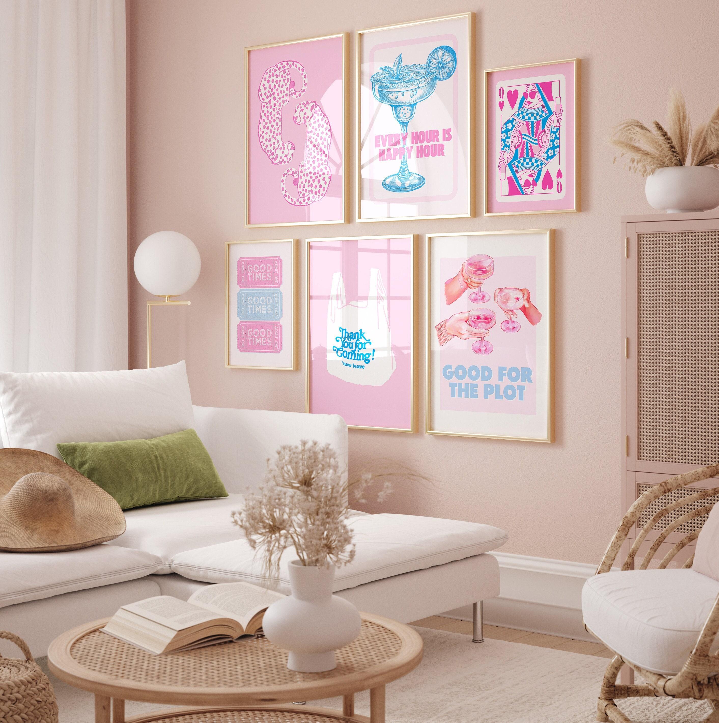 Aesthetic dorm room gallery wall with various posters and decor
