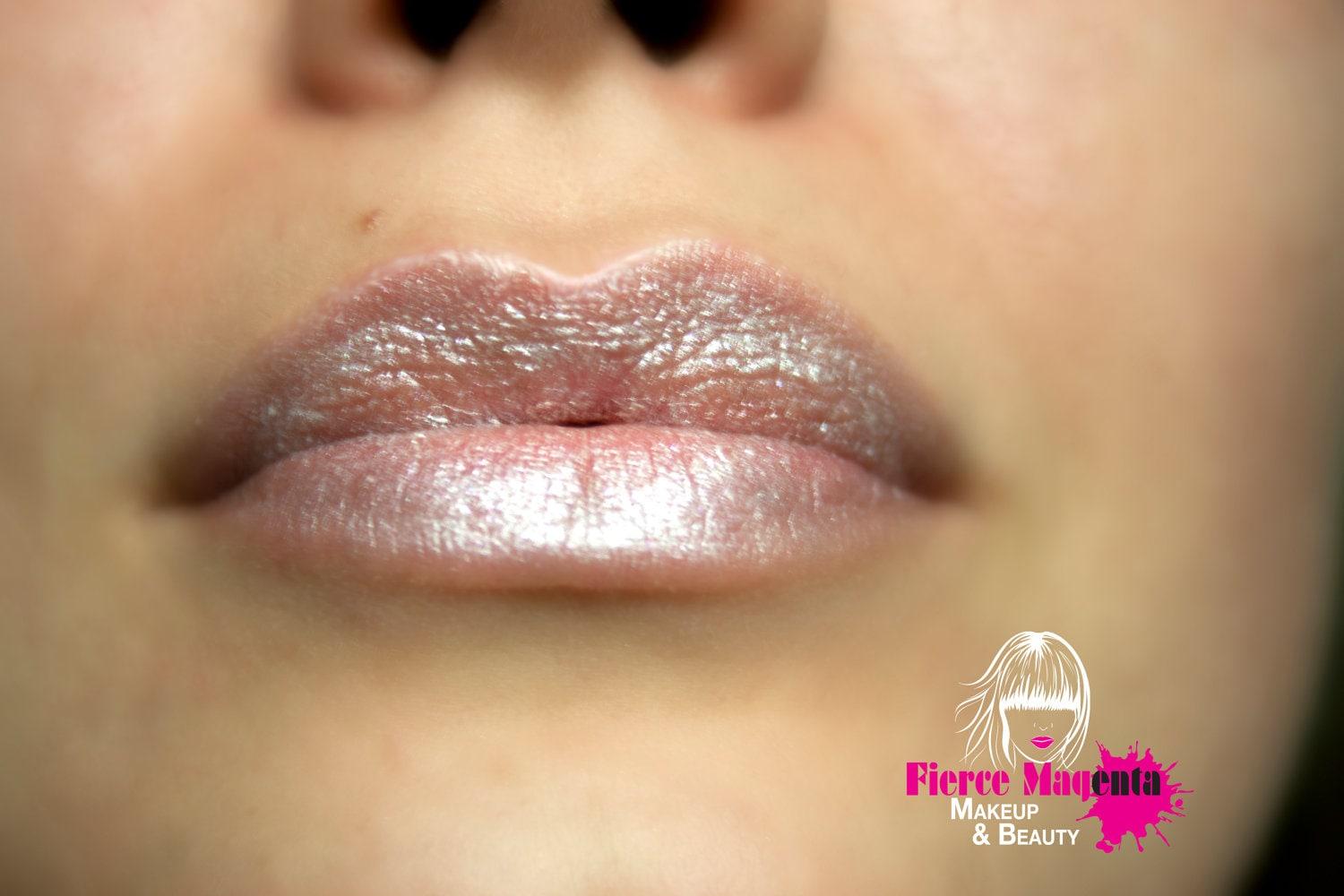 close up of frosted lips with glittery lip gloss