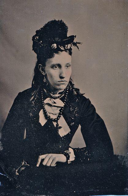 Victorian woman wearing jet earrings